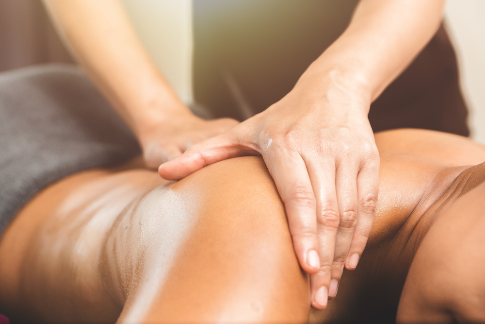 A skilled therapist target the areas of tension during a body massage