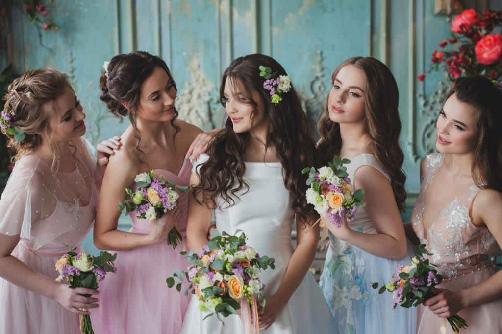10 Wedding Hairstyle Ideas for Your Special Day 1 10 Wedding Hairstyle Ideas for Your Special Day / Floral Boho Waves / Vintage Waves / Messy Bun with Soft Tendrils / Textured Updo / Sleek and Straight / Chic Braided Crown / Half-Up, Half-Down / Romantic French Twist / Loose Waves with a Side Part / Classic Low Bun / Choosing the Perfect Wedding Hairstyle for Your Big Day / Ciao Bella Salon Spa Islamorada Florida / Bridal Services