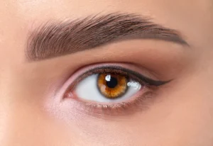 Eyes and eyebrows are closed. Portrait of a beautiful teenage girl with beautiful makeup and clean and healthy skin. Concept of makeup and cosmetology. / Permanent Eyeliner - The Ultimate Guide To A Beautiful, Effortless Look / What Is Permanent Eyeliner? / Why Should You Consider Permanent Eyeliner? / The Permanent Eyeliner Procedure: What to Expect / Benefits of Permanent Eyeliner / Long-Lasting Results / Enhance Your Natural Beauty / How to Choose the Right Technician for Permanent Eyeliner / FAQs About Permanent Eyeliner / Ciao Bella Salon and Spa in Islamorada Florida