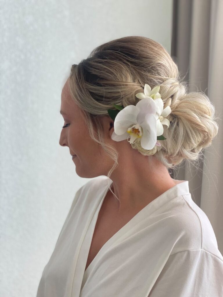 The Textured Low Bun - Beach Wedding Hair & Makeup Styles in Islamorada / Your Guide to Picture-Perfect Looks in the Florida Keys / Why Beach Wedding Beauty Needs a Different Approach / Hair Styles That Shine on the Shore / Makeup Styles That Last and Glow / Getting Ready in Paradise with Ciao Bella / Why Brides Choose Islamorada / Don’t Forget These Wedding Hair & Makeup Tips / Ciao Bella Salon and Spa in Islamorada