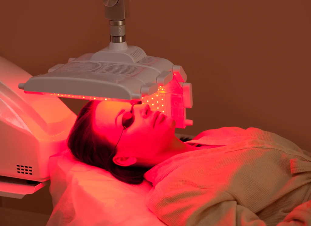 woman lying table with protect glasses eyes have skin treatment beauty device beauty spa salon