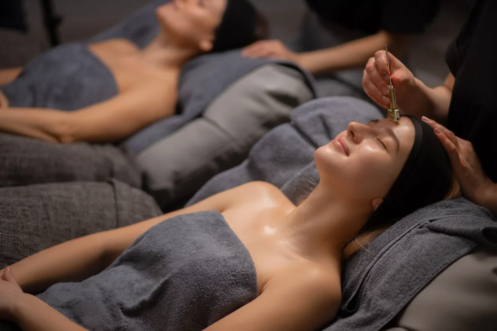 Award-Winning Spa Treatments in Islamorada: Relax & Rejuvenate at Ciao Bella 2 professional masseur use derma roller for face lifting - Award-Winning Spa Treatments in Islamorada: Relax & Rejuvenate at Ciao Bella