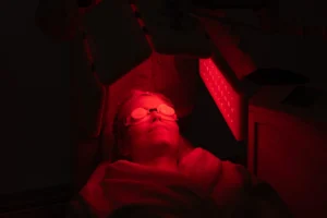 relaxing facial treatment with red light therapy - The Longevity Gift: Why Red Light Therapy is the Ultimate Mother’s Day Self-Care - Ciao Bella Islamorada Salon Spa