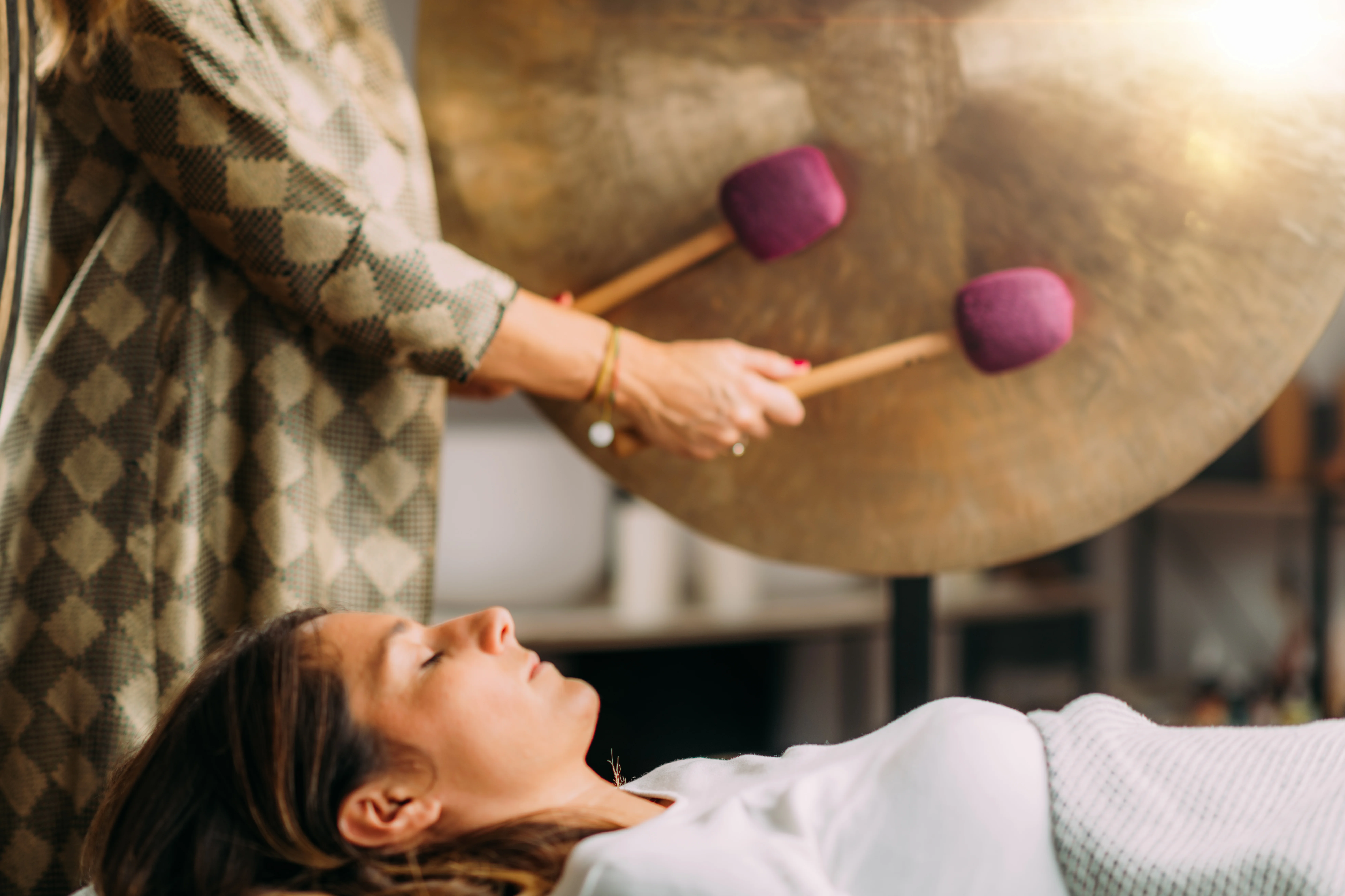 gong in sound bath therapy - The Science of Sound: How a Sound Healing Session Resets Your Nervous System - Ciao Bella Islamorada