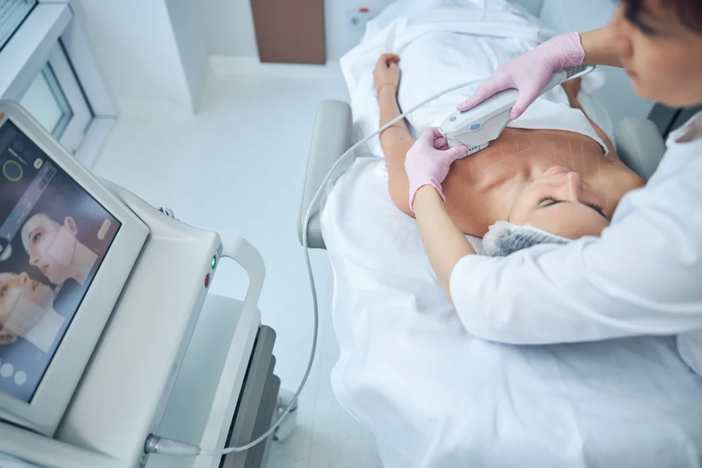 adult woman receiving skin treatment at clinic