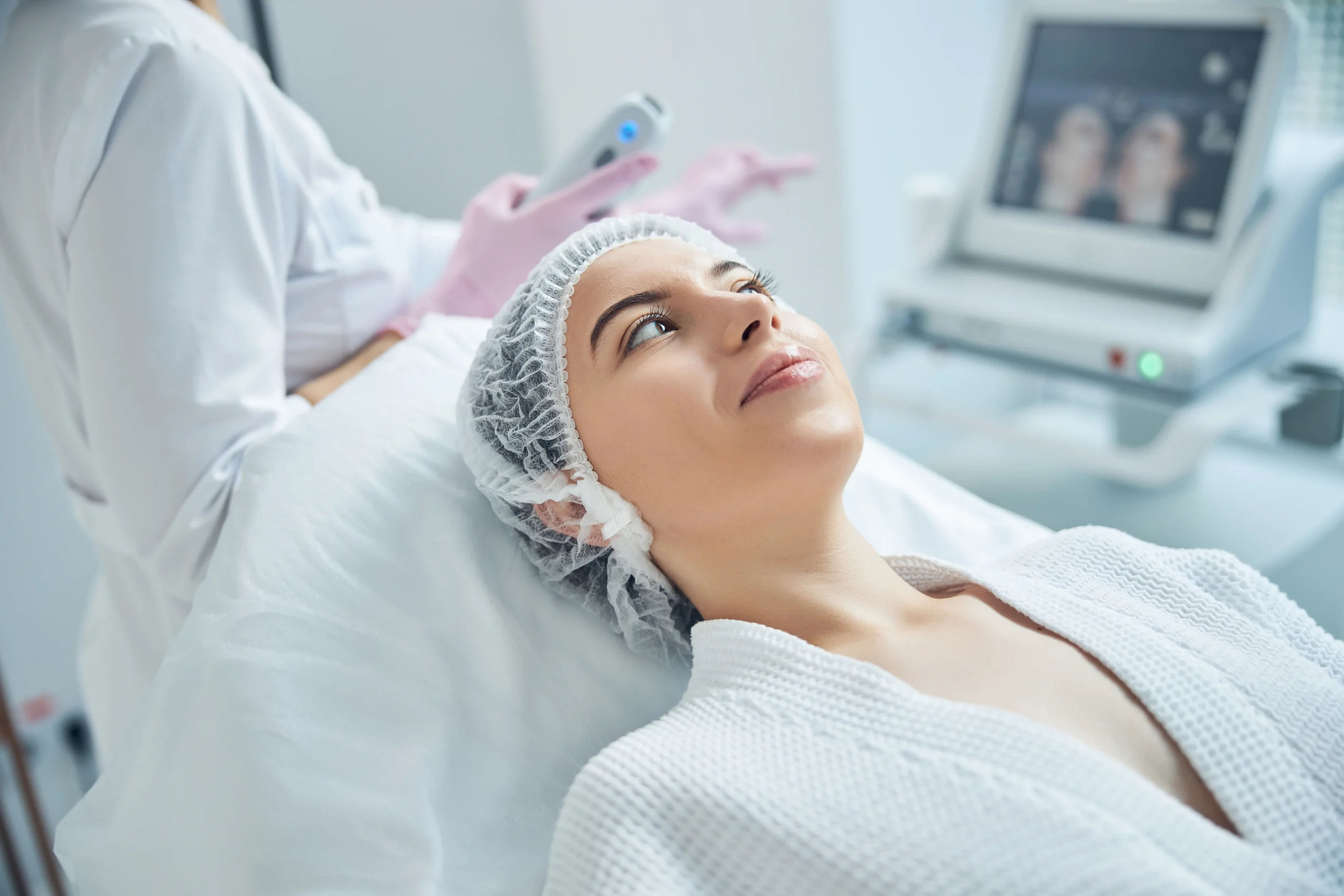 How Are Next-Gen Non-Invasive Treatments Changing the Future of Skincare? - woman receiving beauty treatment in medical spa