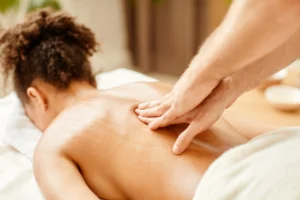 relaxing massage therapy session at spa indoors